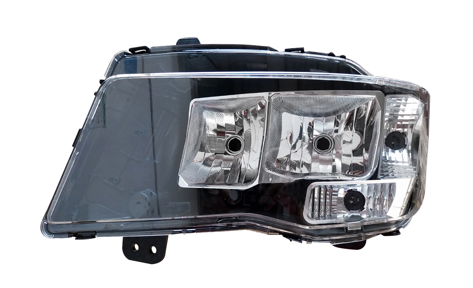 PROIETTORE SINISTRO ELETTRICO ALOGENO 24V CON PORTA LAMPADA SENZA LAMPADINE (H7 - H7 - P21/5W - PY21W) CON MOTORINO - CONNETTORE RETTANGOLAREPOSTERIORE CENTRALE SINISTRO 9 PIN - MAN - TGS 2020 - 8125